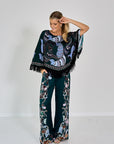 BLOUSE PONCHO MET FRANJES
