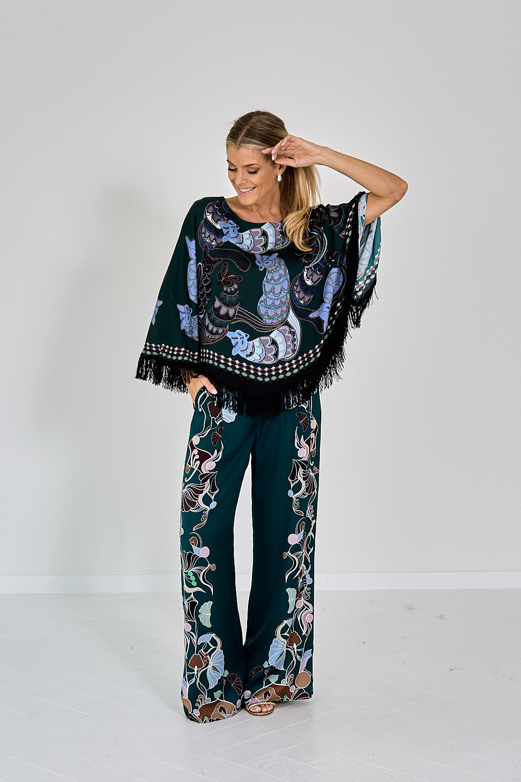 BLOUSE PONCHO MET FRANJES