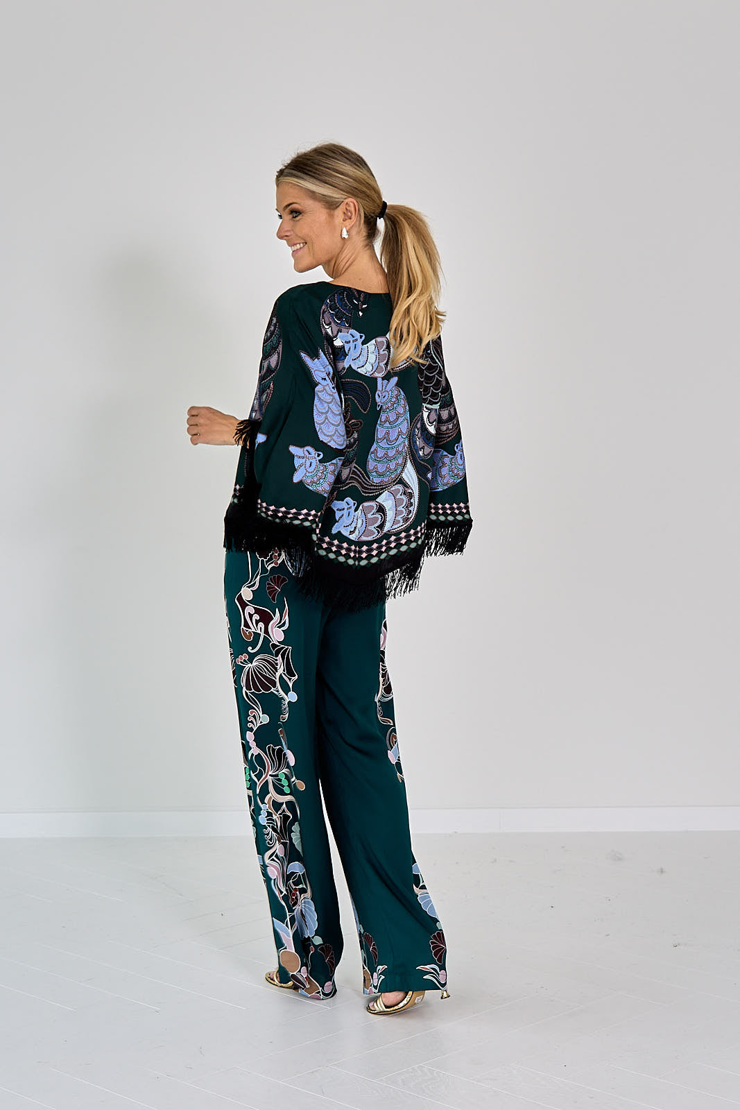 BLOUSE PONCHO MET FRANJES